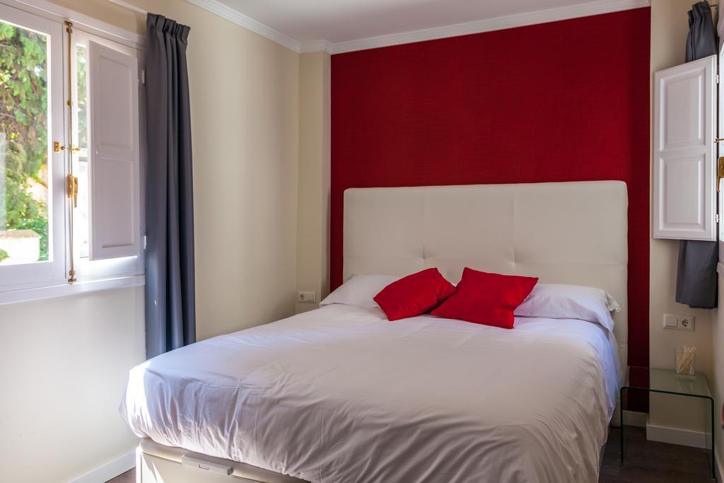 Apartamentos Valentina Deluxe 3000 Granada Habitación foto